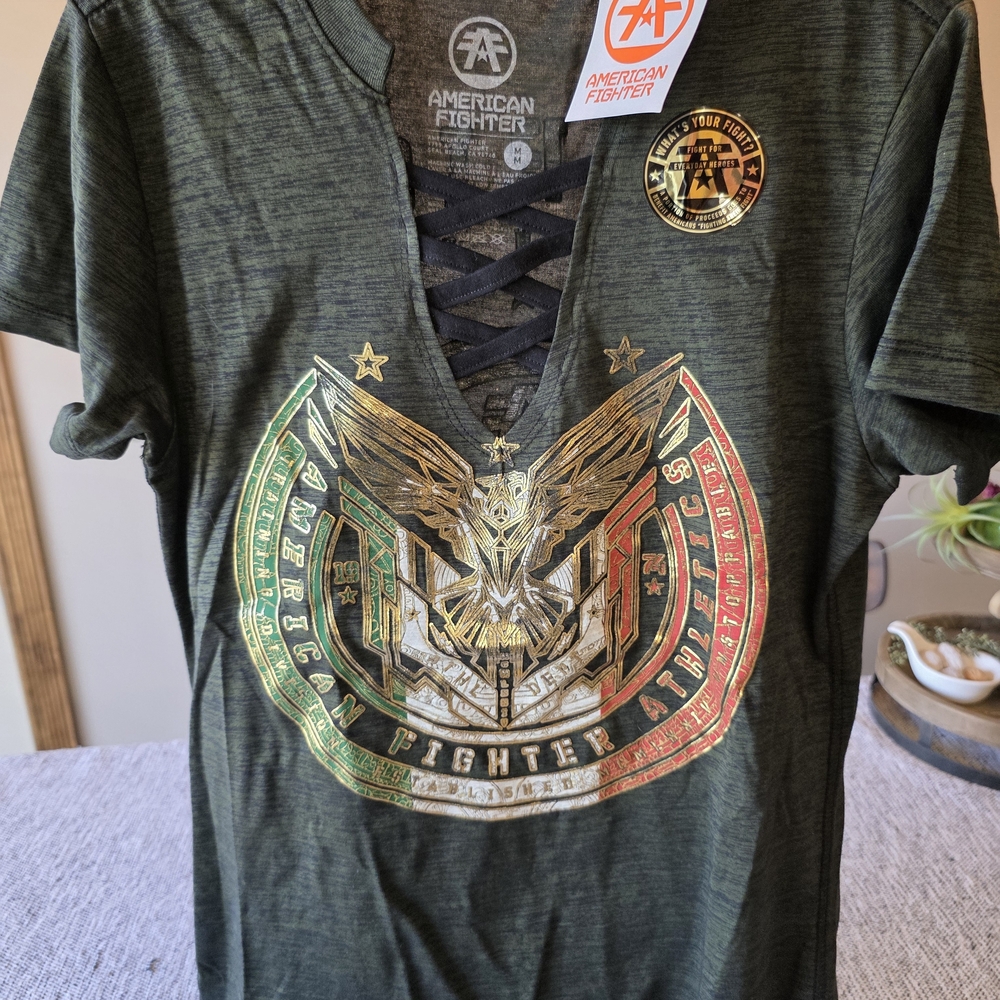 American Fighter Olive Green Lace-Up Graphic Tee with Metallic Accents